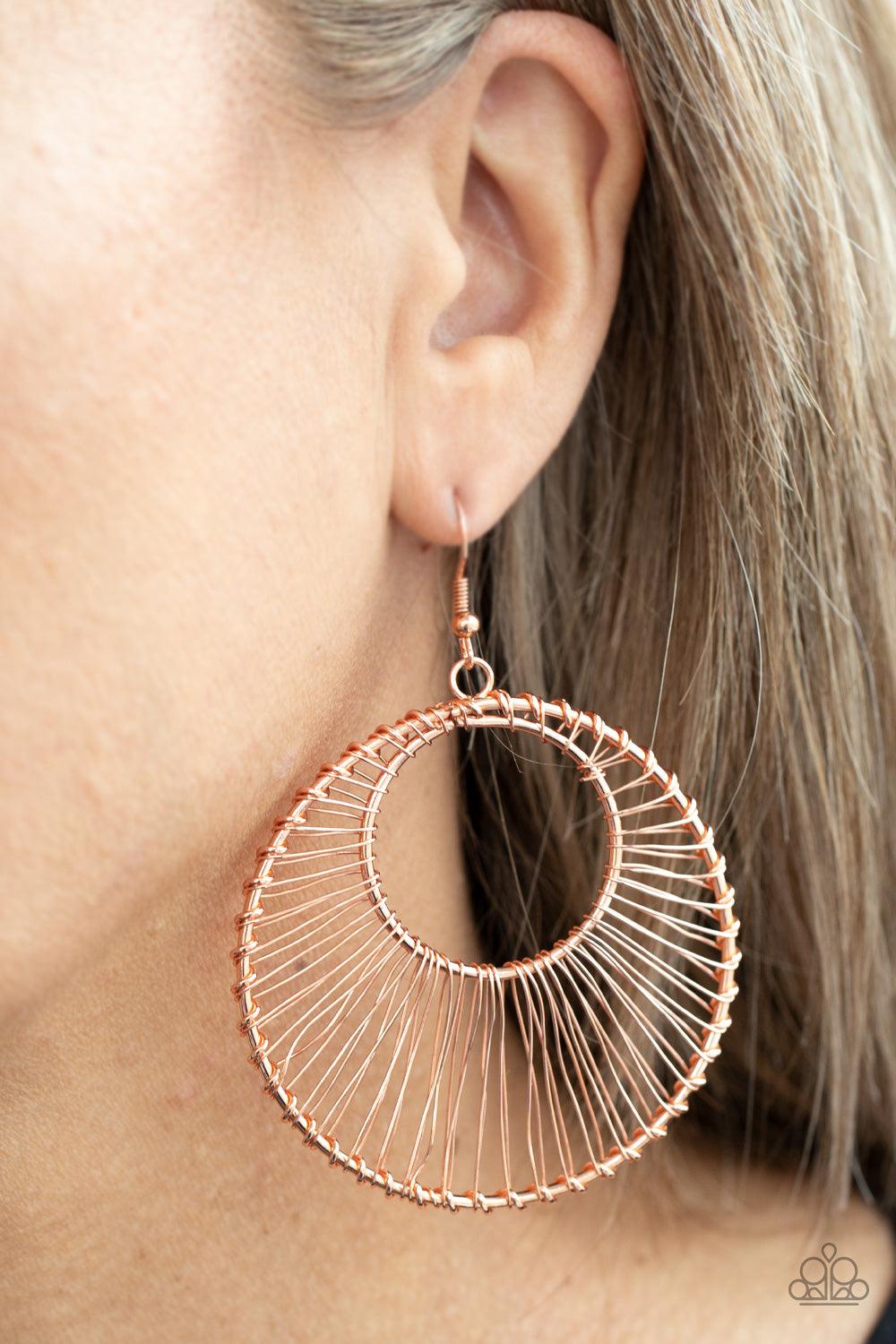 Paparazzi Accessories Artisan Applique - Copper Shiny copper wire wraps around two shiny copper hoops, creating an airy crescent shaped frame for an artisan inspired fashion. Earring attaches to a standard fishhook fitting. Sold as one pair of earrings. J