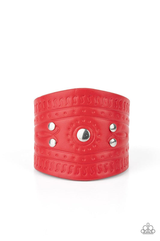 Paparazzi Accessories Orange County - Red Dotted in shiny silver studs, a triangular piece of red leather is stamped in indigenous inspired patterns for an urban flair. Features an adjustable snap closure. Sold as one individual bracelet.2.77 Bracelets