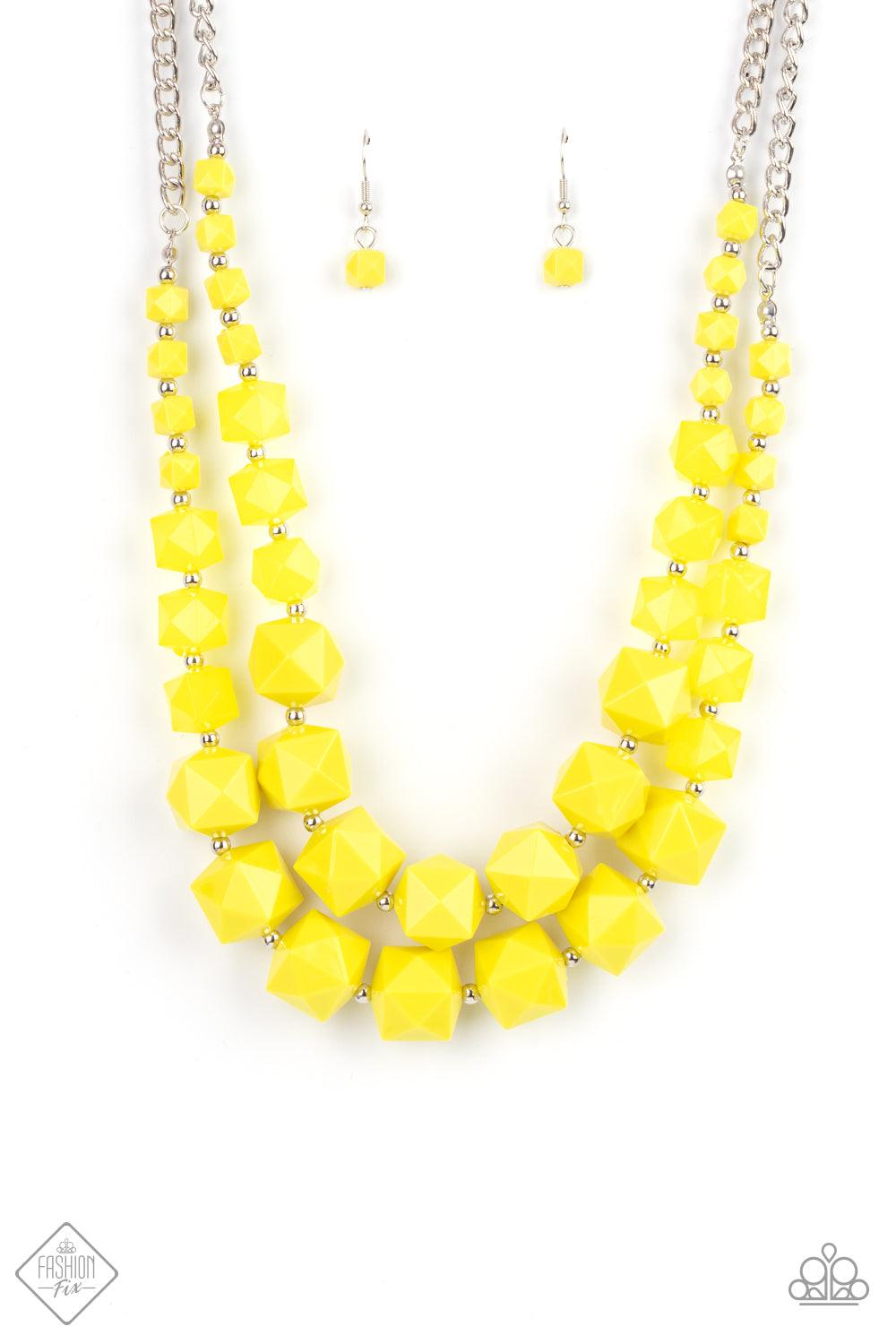 Paparazzi Accessories Summer Excursion - Yellow A faceted collection of opaque and solid Illuminating cube beads gradually increase in size as they alternate with dainty silver beads below the collar. Infused with sections of classic silver chains, the ed