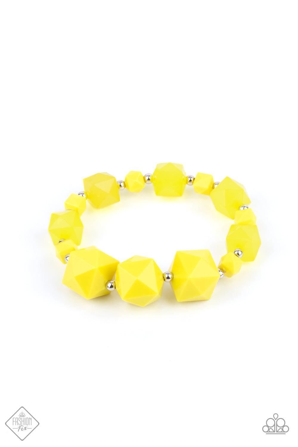 Paparazzi Accessories Trendsetting Tourist - Yellow Varying in size, a faceted collection of solid and opaque Illuminating cube beads alternate with dainty silver beads to decorate a stretchy band that wraps around the wrist for a glamorous pop of geometr