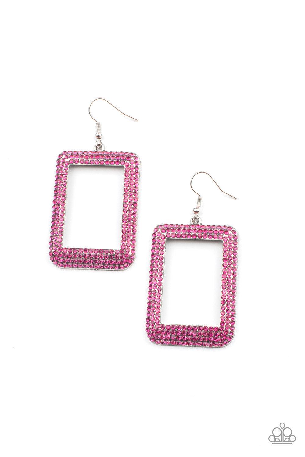 Paparazzi Accessories World FRAME-ous - Pink Bordered in rows of glittery pink rhinestones, an oversized silver rectangular frame swings from the ear for a fashionable finish. Earring attaches to a standard fishhook fitting. Sold as one pair of earrings.