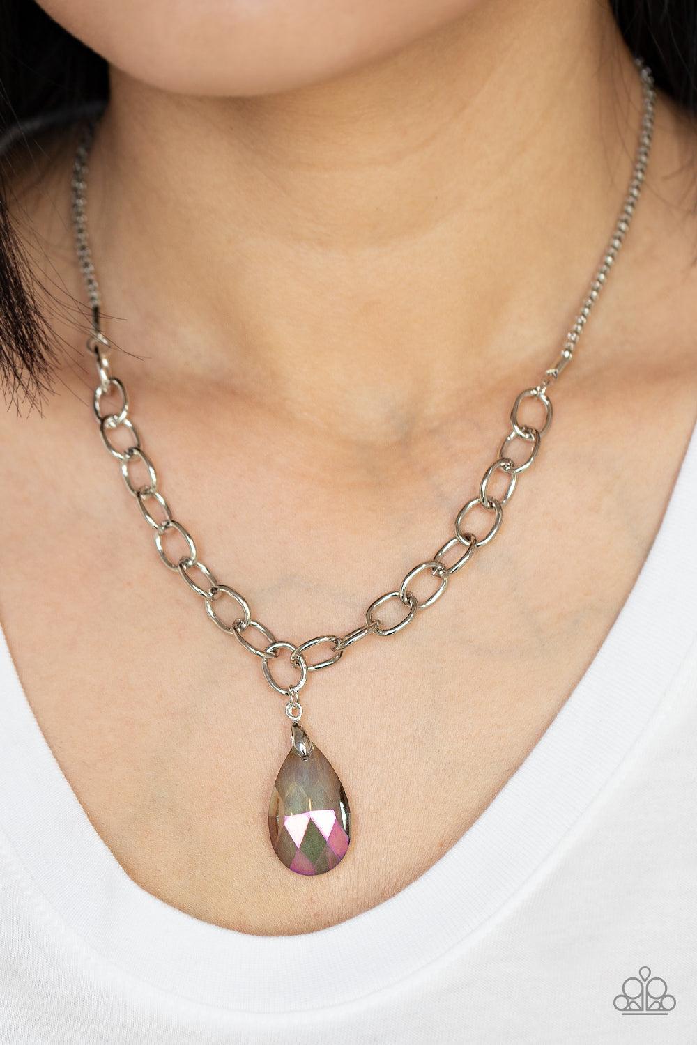 Paparazzi Accessories Mega Modern - Multi Flecked in oil spill iridescent, a smoky teardrop swings from the bottom of a chunky silver chain that attaches to a shimmery silver popcorn chain, creating a modern display below the collar. Features an adjustabl