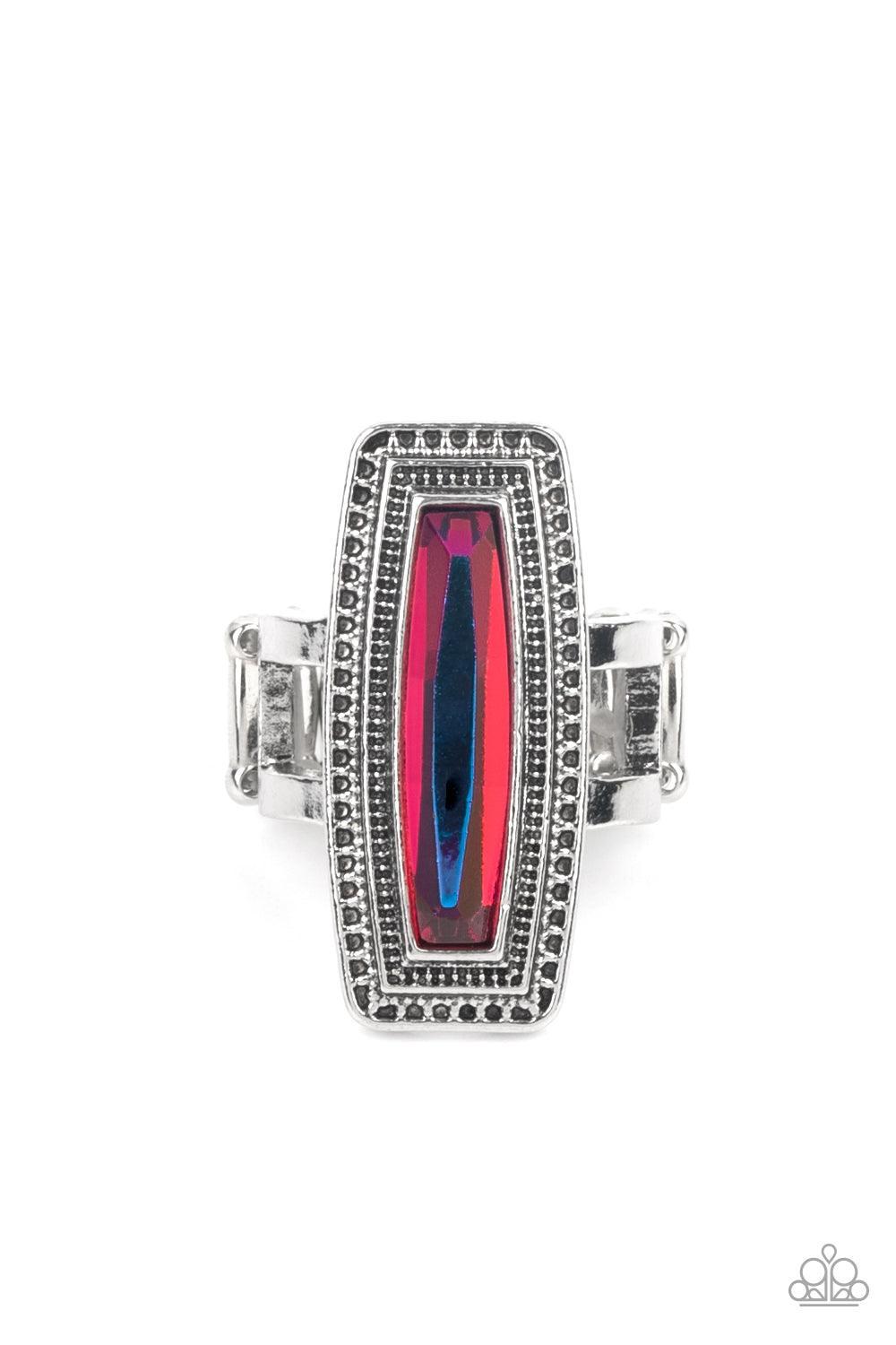 Paparazzi Accessories Luminary Luster - Multi An elongated UV gem is pressed into the center of a studded silver frame atop layered silver bands, creating a stellar centerpiece atop the finger. Features a stretchy band for a flexible fit. Sold as one indi