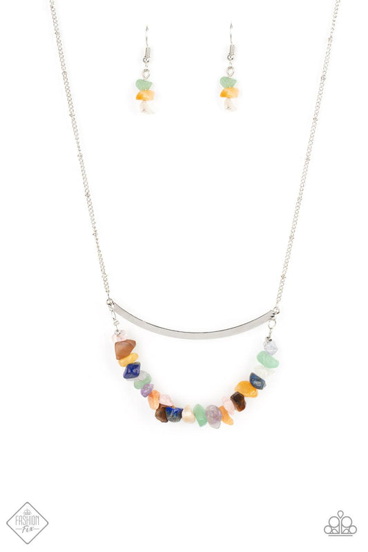 Paparazzi Accessories Pebble Prana A row of raw cut multicolored rocks are threaded along a dainty wire that bows at the bottom of a curved silver bar, creating an earthy pendant. The colorfully stacked frame swings from the bottom of a lengthened silver