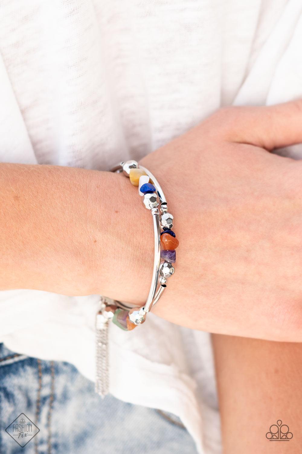 Paparazzi Accessories Mineral Mosaic - Multi An earthy collection of faceted silver beads, raw cut multicolored rock beads, and cylindrical silver accents are threaded along a coiled wire around the wrist for a grounding pop of color. A shimmery silver ch