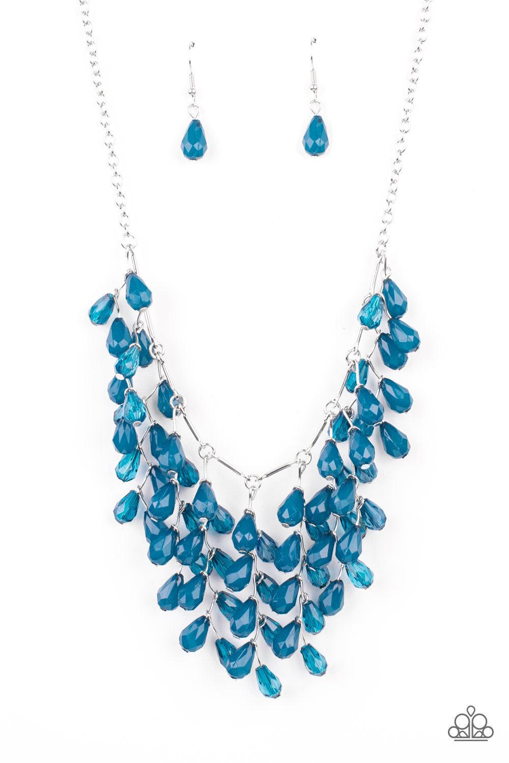 Paparazzi Accessories Garden Fairytale - Blue A shimmery collection of opaque and clear crystal-like Mykonos Blue teardrop beads delicately cluster along a linked strand of silver bars, creating an ethereally leafy fringe below the collar. Features an adj