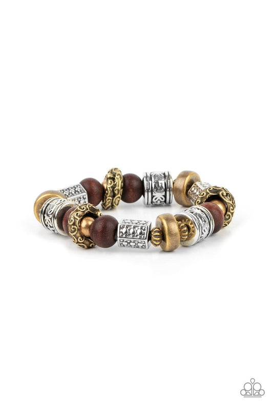 Paparazzi Accessories Exploring The Elements - Multi Stamped, studded, and embossed in tribal inspired patterns, a collection of chunky brass and silver beads join earthy wooden beads along a stretchy band around the wrist for an earthy flair. Sold as one