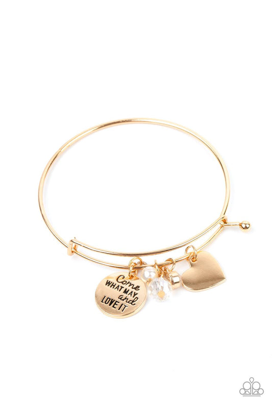 Paparazzi Accessories Come What May and Love It - Gold Infused with a shiny gold heart frame, a dainty gold disc stamped in the phrase, "Come what may and love it," joins pearl, crystal, and rhinestone charms along a bangle-like bracelet for a whimsy look