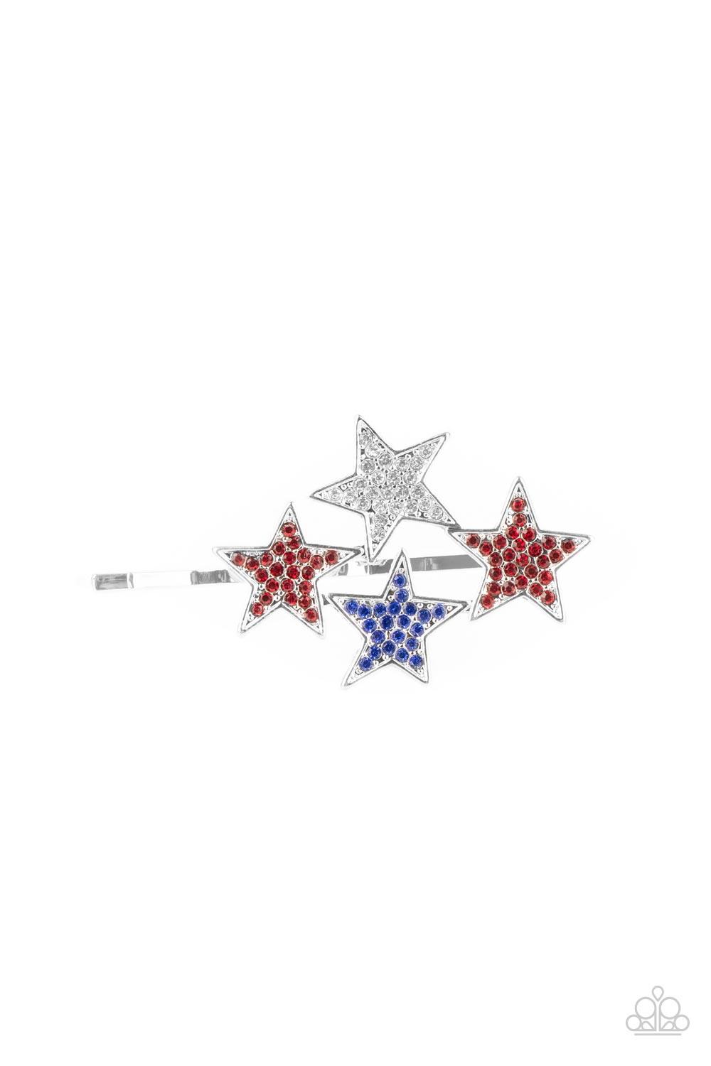 Paparazzi Accessories Stellar Celebration - Red Dotted in red, white, and blue rhinestones, an explosion of stars adorns the front of a silver bobby pin for a stellar patriotic shimmer. Sold as one individual decorative bobby pin. Jewelry