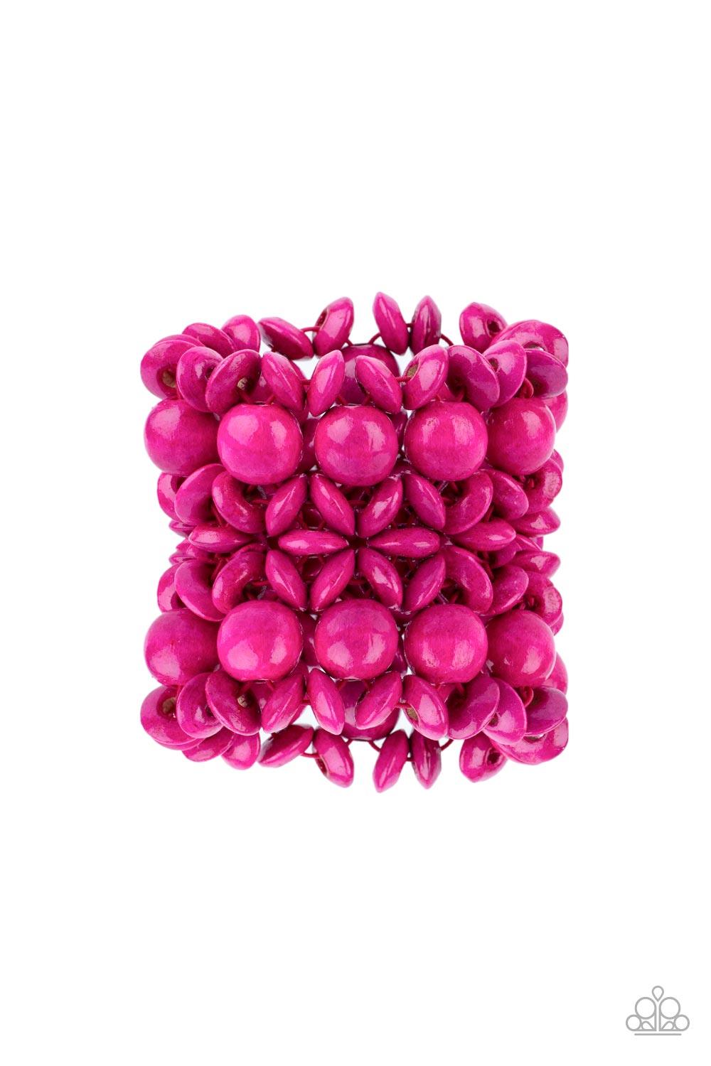 Paparazzi Accessories Island Mixer - Pink Brushed in a vibrant pink finish, an oversized collection of disc shaped and round wooden beads are threaded along ornately knotted woven stretchy bands around the wrist for a tropical inspired fashion. Sold as on