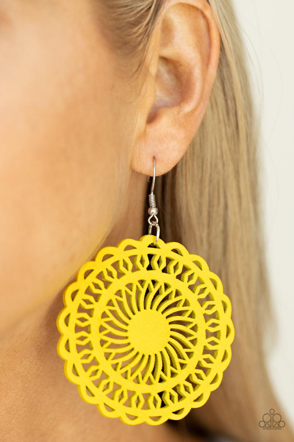 Paparazzi Accessories Island Sun - Yellow Painted in a sunny yellow finish, a stenciled wooden frame is cutout into a radiating sunburst frame for a colorfully tropic look. Earring attaches to a standard fishhook fitting. Sold as one pair of earrings. Jew