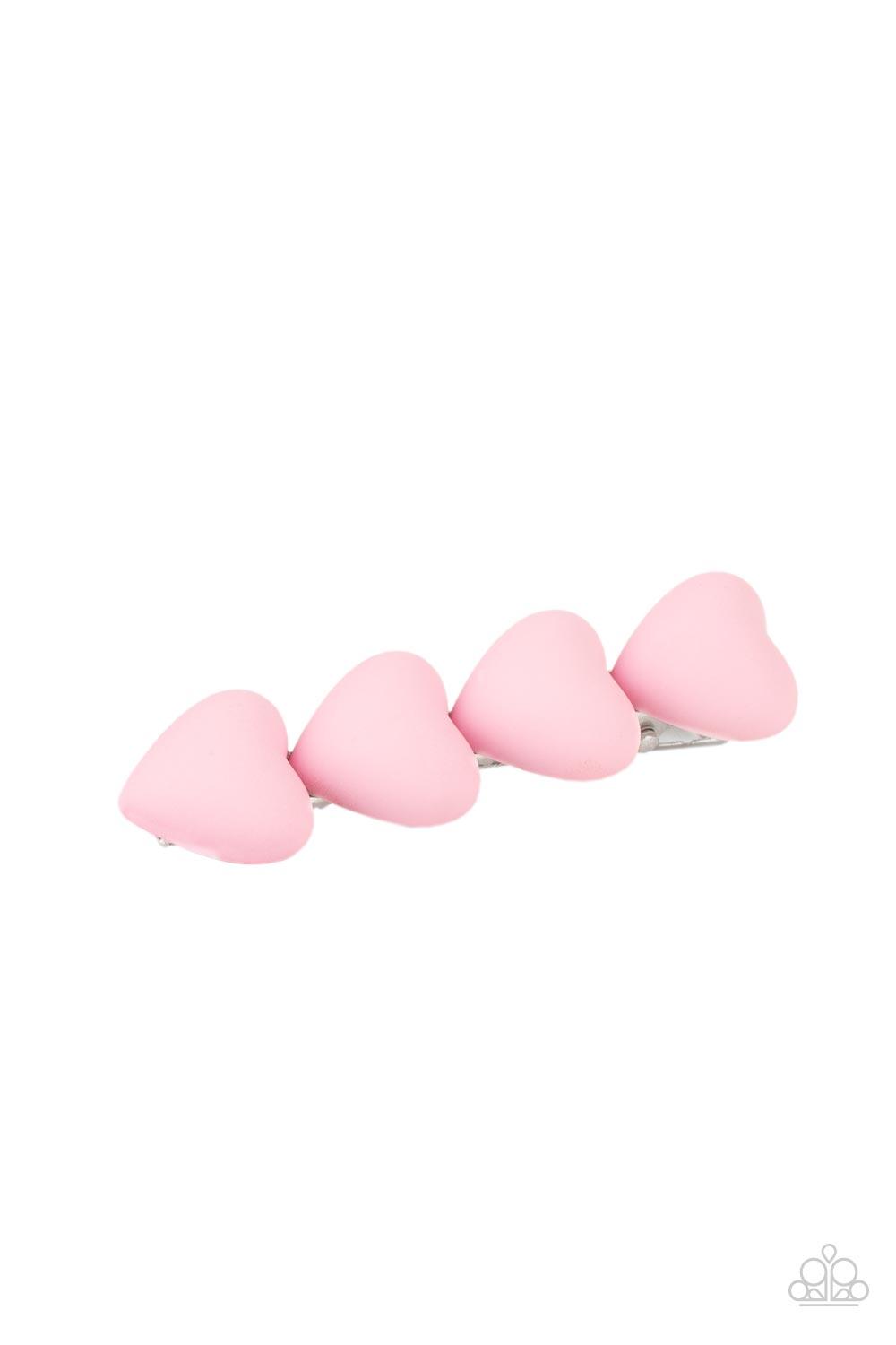 Paparazzi Accessories HEART to Please - Pink Featuring a rubbery matte finish, a bubbly row of pink hearts stack into a flirtatious centerpiece. Features a standard hair clip on the back. Sold as one individual hair clip. Hair Pins