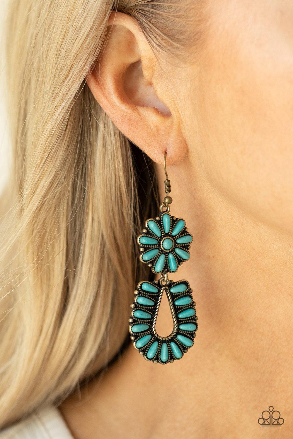 Paparazzi Accessories Badlands Eden - Brass Infused with studded brass fittings, two turquoise stone frames connect into a squash blossom for an authentically southwestern inspired look. Earring attaches to a standard fishhook fitting. Sold as one pair of