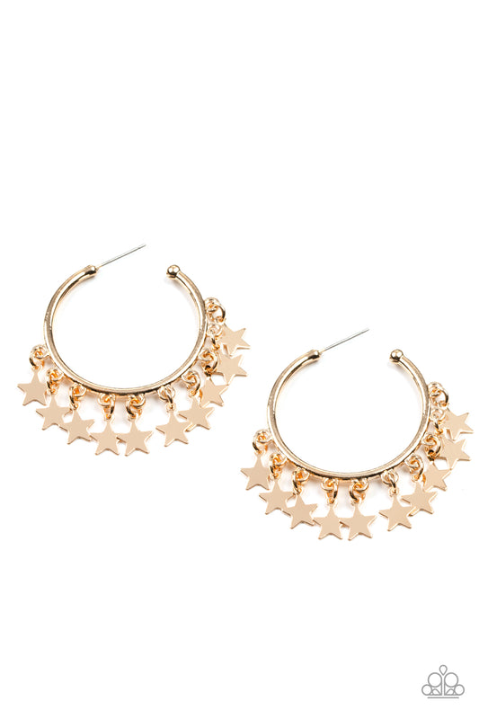 Paparazzi Accessories Happy Independence Day - Gold A shiny collection of gold star charms trickles from the bottom of a classic gold hoop, creating a stellar fringe. Earring attaches to a standard post fitting. Hoop measures approximately 1 1/4" in diame
