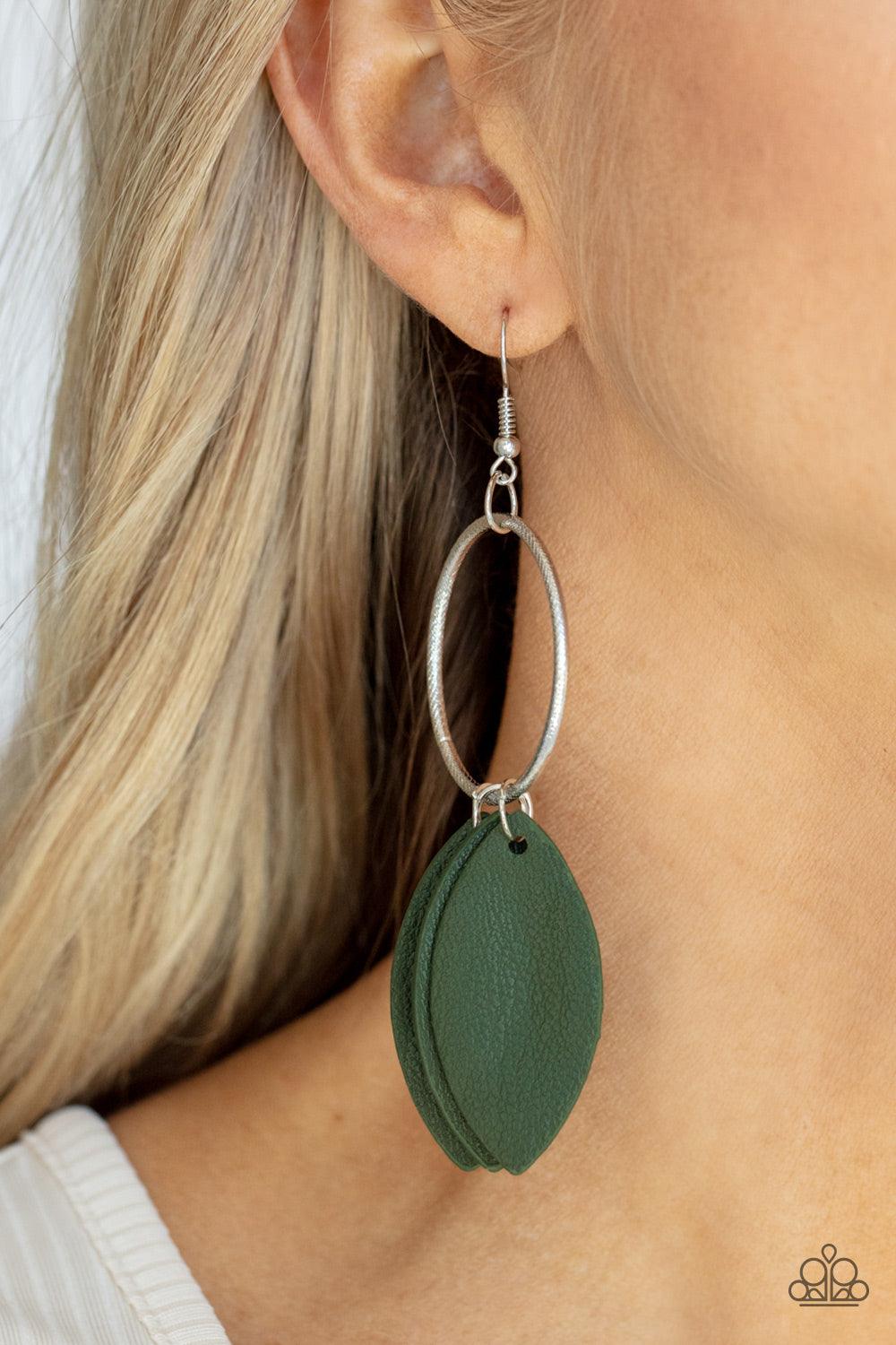 Paparazzi Accessories Leafy Laguna - Green Leafy green leather frames swing from the bottom of a textured silver hoop, creating an earthy fringe. Earring attaches to a standard fishhook fitting. Sold as one pair of earrings. Jewelry