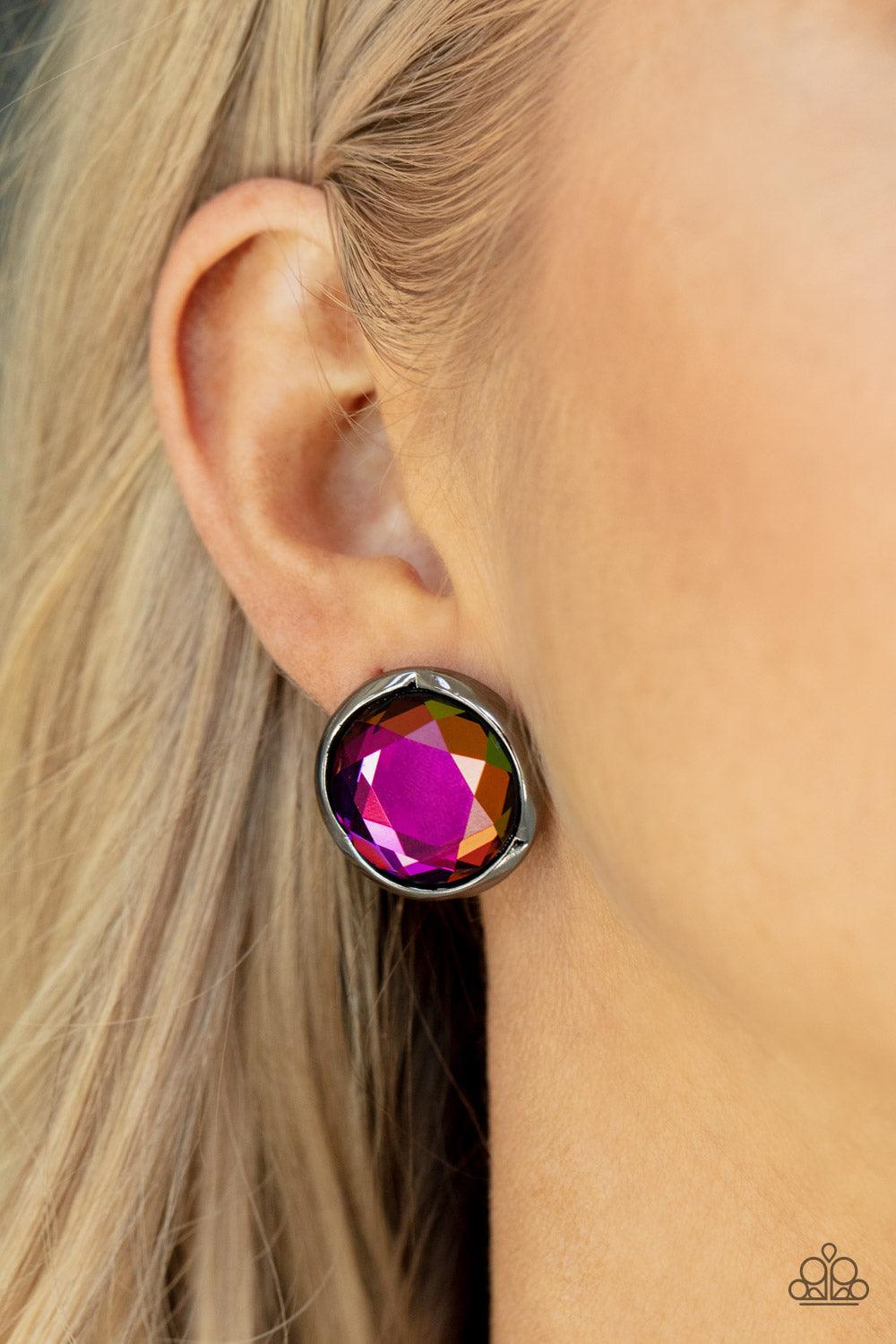 Paparazzi Accessories Double-Take Twinkle - Multi Featuring a flashy faceted finish, an oversized oil spill gem is pressed into a sleek gunmetal fitting for a dramatic pop of dazzle. Earring attaches to a standard post fitting. Sold as one pair of post ea