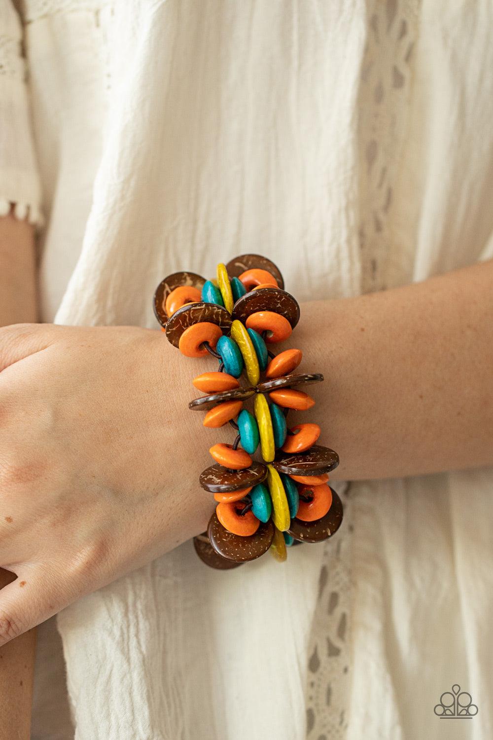 Paparazzi Accessories Caribbean Canopy - Multi A colorful collection of brown, orange, yellow, and turquoise disc-shaped wooden beads are threaded along stretchy bands creating a tropical island vibe around the wrist. Sold as one individual bracelet. Brac