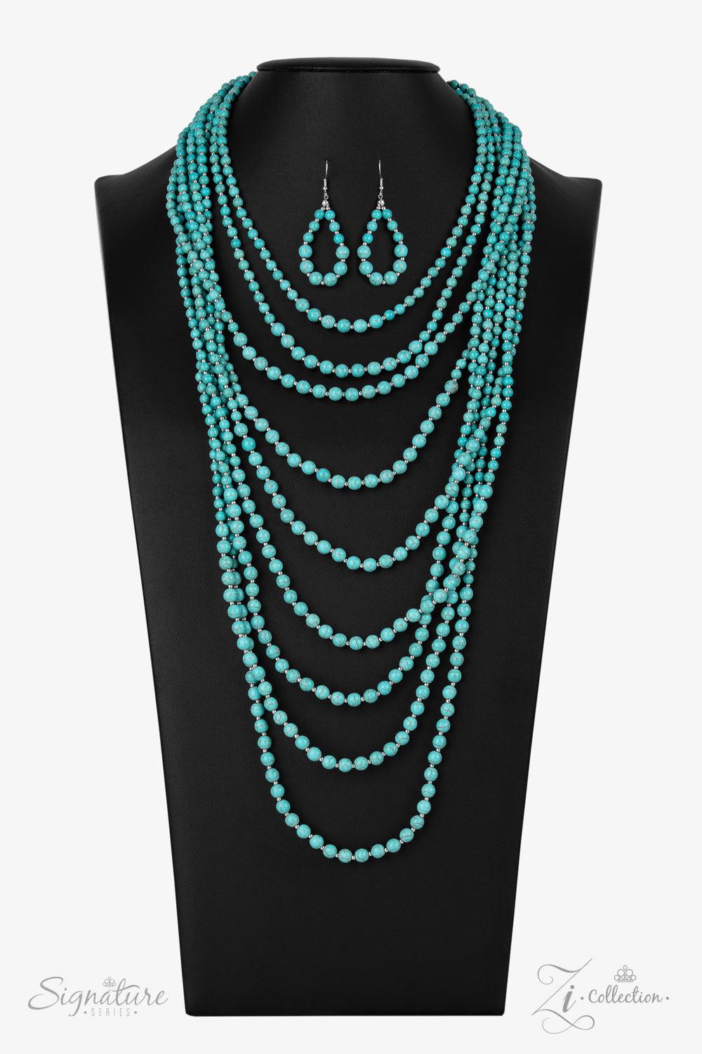 Paparazzi Accessories The Hilary Intermixed with dainty silver beads, a groundbreaking display of refreshing turquoise stone beads gradually increases in size as they drape into artisan inspired layers down the chest. The trailblazing length combined with
