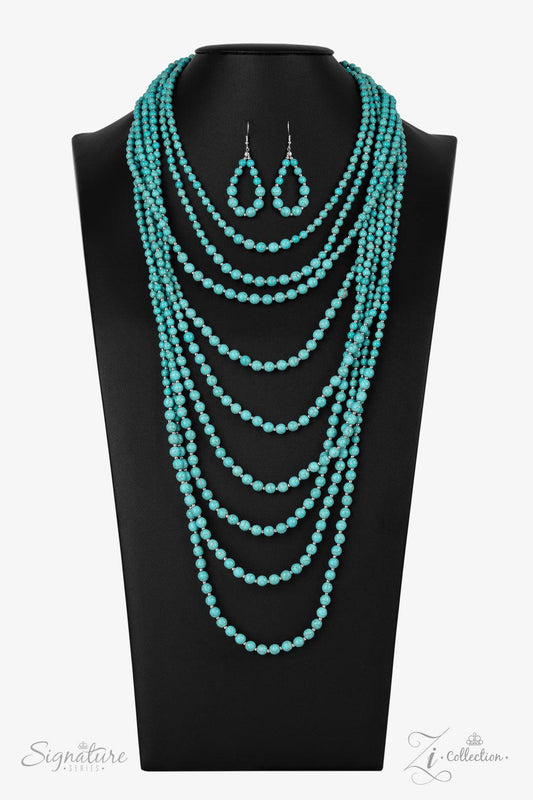 Paparazzi Accessories The Hilary Intermixed with dainty silver beads, a groundbreaking display of refreshing turquoise stone beads gradually increases in size as they drape into artisan inspired layers down the chest. The trailblazing length combined with