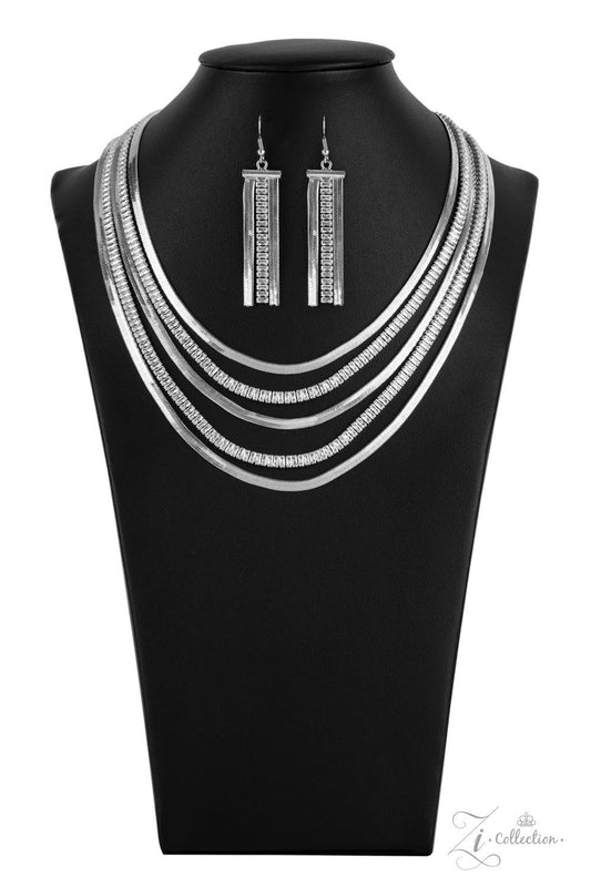 Paparazzi Accessories Persuasive Alternating rows of flat silver snake chain and glassy strands of edgy emerald cut rhinestones sleekly layer below the collar. The deceptively simple metallic silver and white rhinestone palette is unapologetically mesmeri