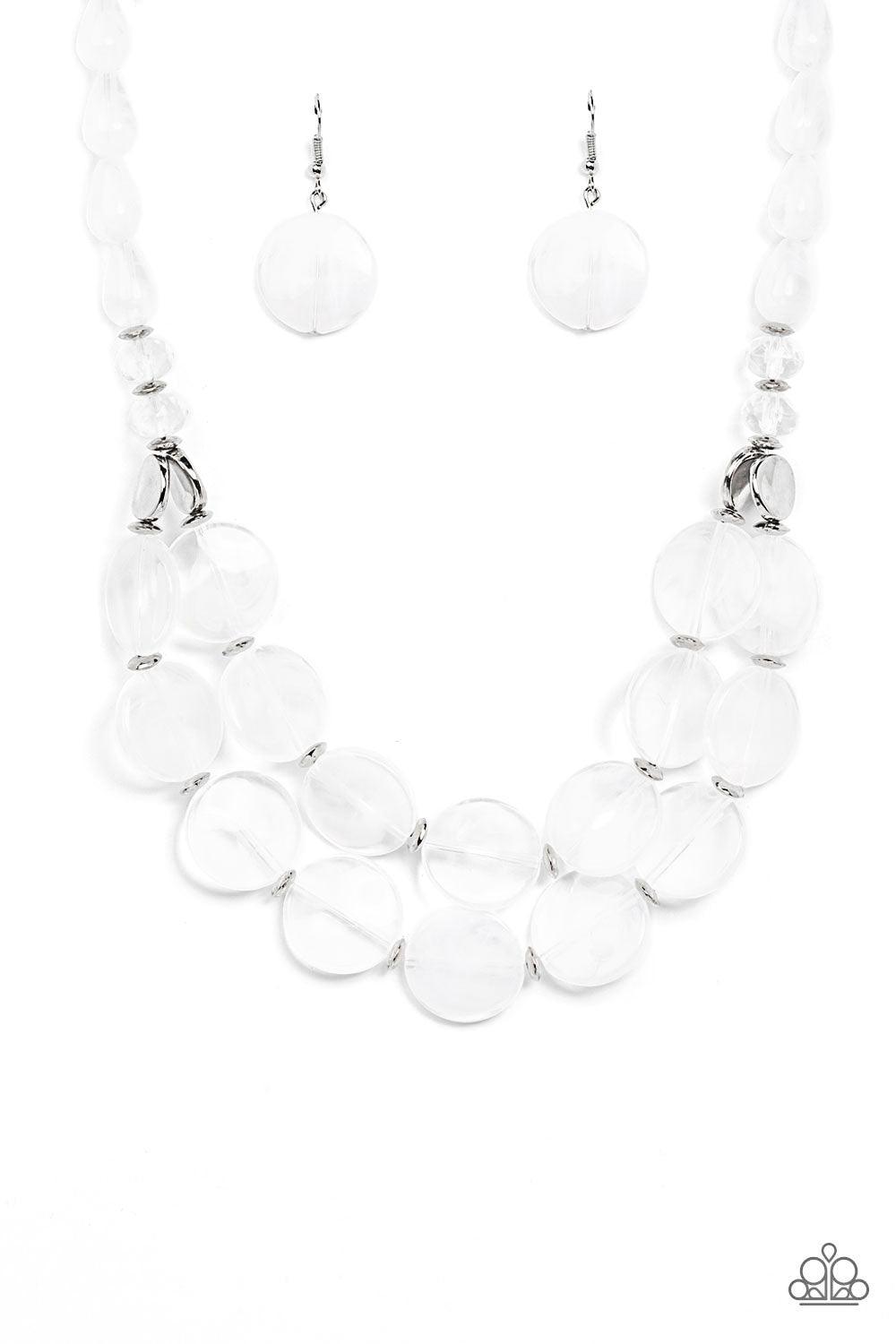 Paparazzi Accessories Beach Day Demure - White Intermixed with glassy crystal-like beads and shiny silver accents, mismatched cloudy, glassy, and opaque white teardrop and disc beads layer below the collar for a classic pop of neutral color. Features an a