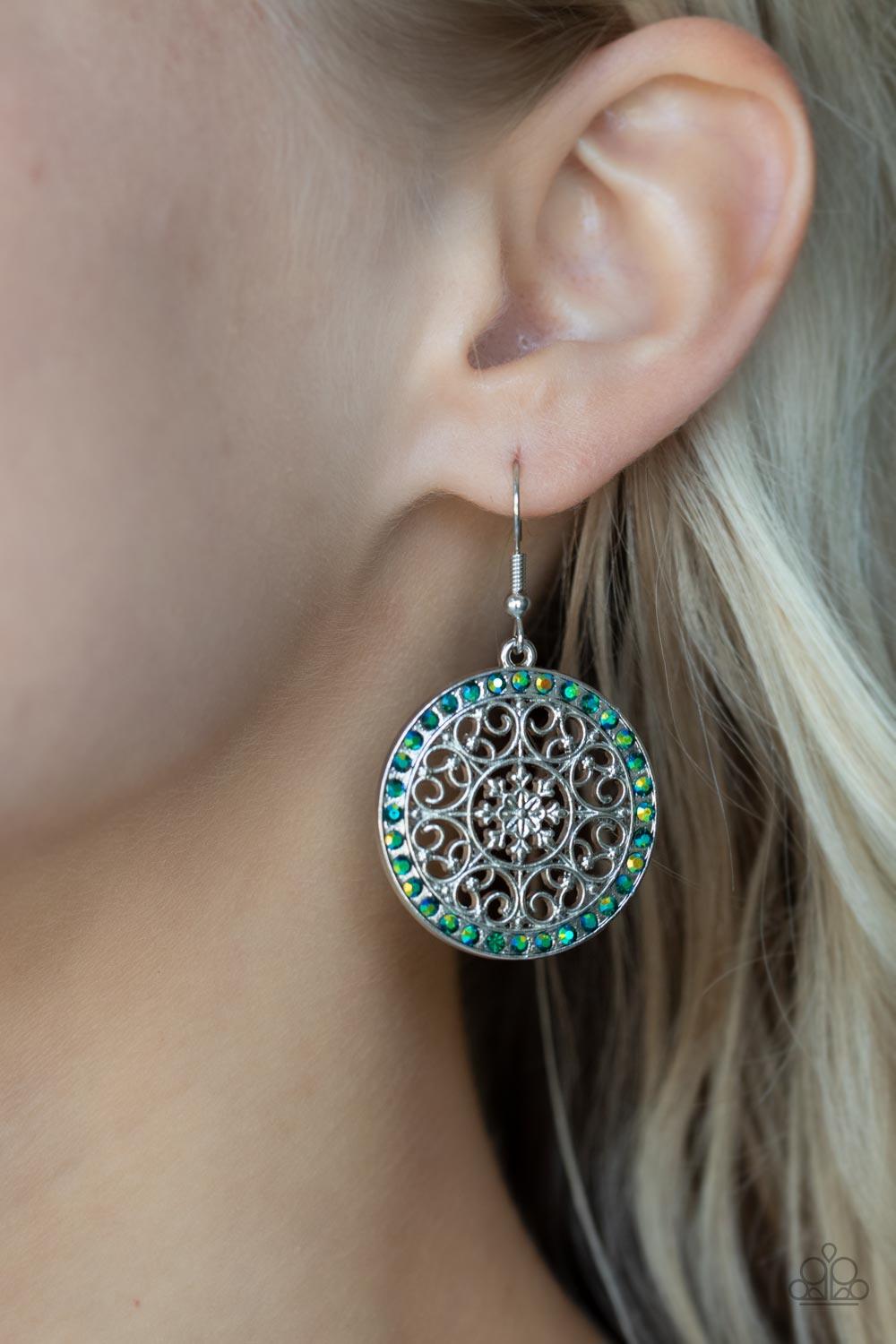 Paparazzi Accessories Bollywood Ballroom - Green Infused with a border of iridescent green rhinestones, studded silver heart shape filigree fans out from a decorative silver floral center for a whimsical look. Earring attaches to a standard fishhook fitti