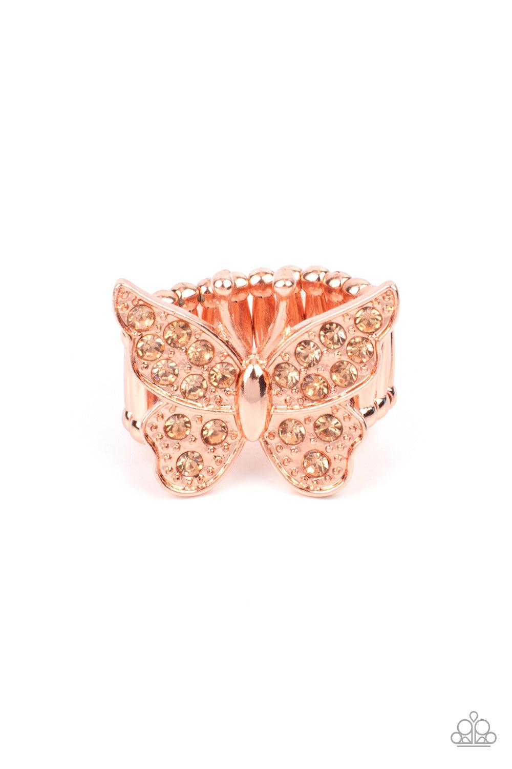 Paparazzi Accessories Bona Fide Butterfly - Copper Encrusted in sparkly rhinestones, a shiny copper butterfly flutters atop the finger for an enchanting fashion. Features a stretchy band for a flexible fit. Sold as one individual ring. Jewelry