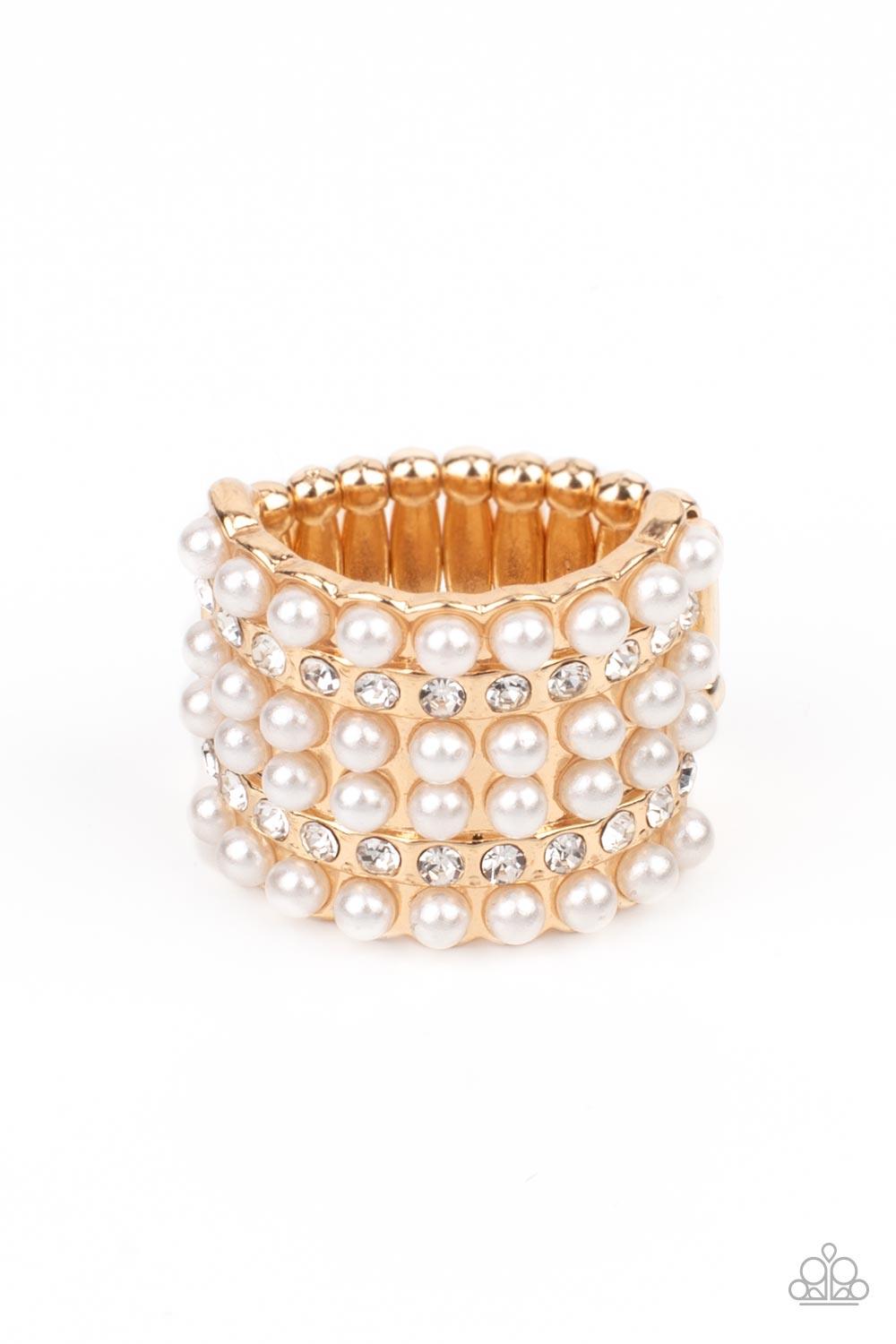 Paparazzi Accessories Verified Vintage - Gold Dainty rows of bubbly pearls and glassy white rhinestones alternate across the front of a thick gold band, creating a vintage inspired statement piece. Features a stretchy band for a flexible fit. Sold as one