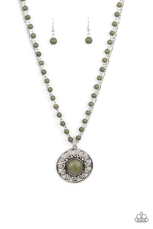 Paparazzi Accessories Sahara Suburb - Green A dainty silver chain is paired with a grounding green stone beaded chain below the collar. An oversized green stone adorns the center of an antiqued silver frame radiating with silver studded and wire-like deta