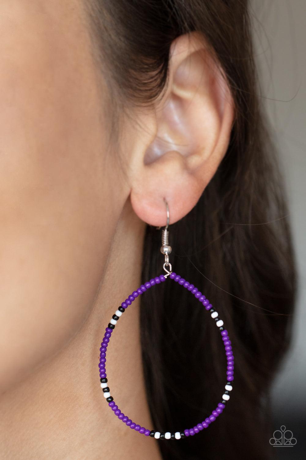 Paparazzi Accessories Keep Up The Good BEADWORK - Purple Broken up with sections of black and white seed beads, a dainty collection of purple seed beads are threaded along an invisible wire, creating a colorful teardrop. Earring attaches to a standard fis