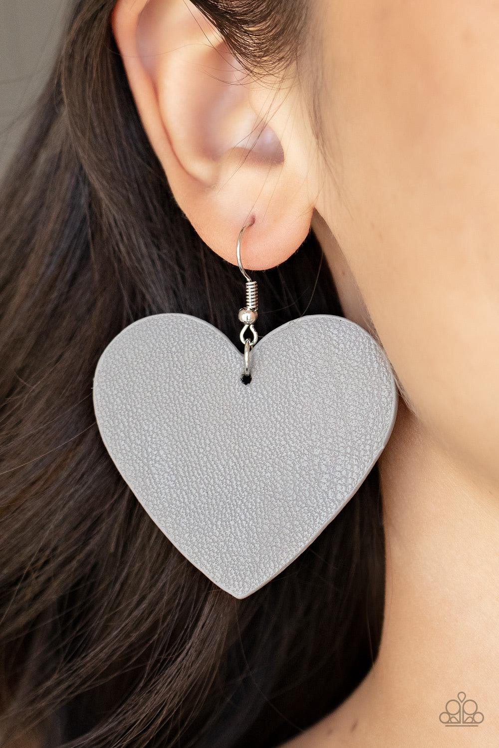 Paparazzi Accessories Country Crush - Silver An Ultimate Gray leather heart frame swings from the ear for a flirtatiously neutral pop of color. Earring attaches to a standard fishhook fitting. Sold as one pair of earrings. Earrings