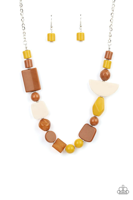 Paparazzi Accessories Tranquil Trendsetter - Yellow Featuring the rustic hues of Adobe, Mustard, and Soybean, mismatched acrylic and faux rock beads are haphazardly threaded along an invisible wire below the collar for an abstract artisan vibe. Features a