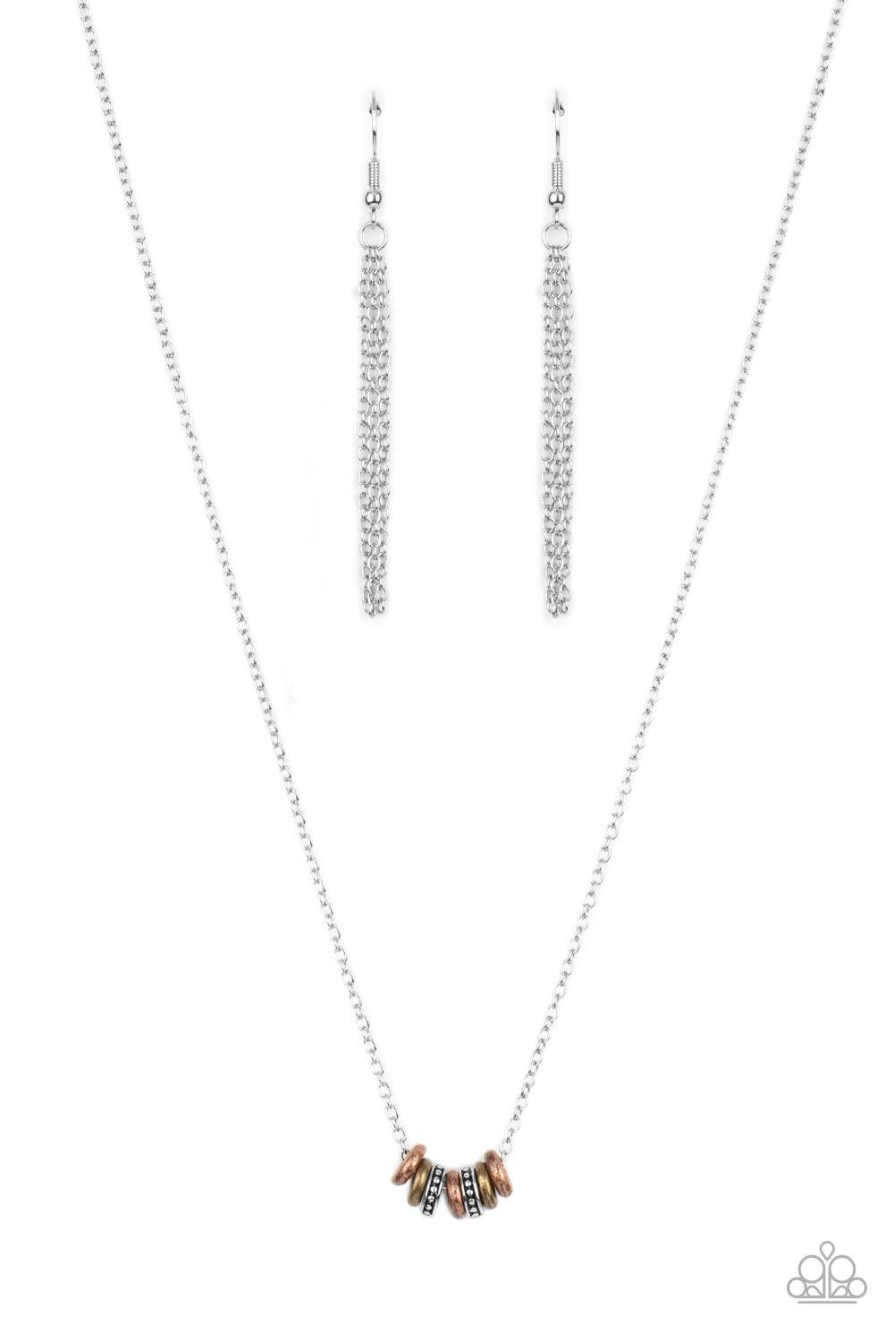 Paparazzi Accessories Dainty Dalliance - Multi An antiqued collection of smooth brass and copper rings and studded silver rings glide along a dainty silver chain below the collar, creating a minimalist inspired look. Features an adjustable clasp closure.