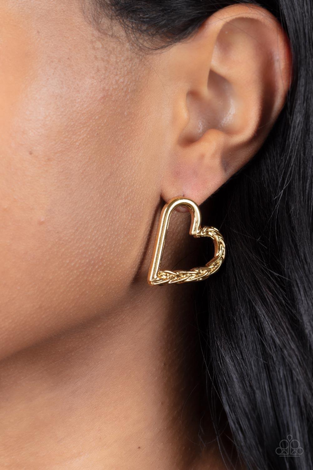 Paparazzi Accessories Cupid, Who? - Gold One side of a glistening gold heart frame is subtlety twisted with twinkly texture, creating a romantic display. Earring attaches to a standard post fitting. Sold as one pair of post earrings. Jewelry