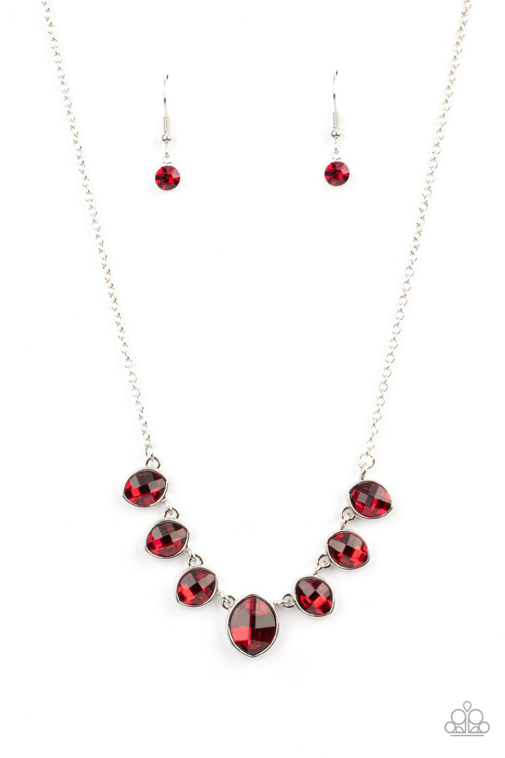 Paparazzi Accessories Material Girl Glamour - Red Encased in sleek silver fittings, elegant cut fiery red rhinestones delicately connect below the collar. An oversized red rhinestone adorns to the middle of the glittery strand, creating a sparkly centerpi
