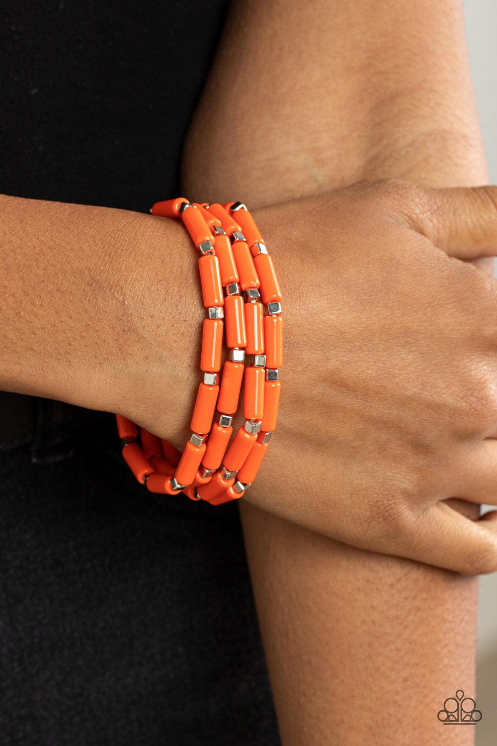 Paparazzi Accessories Radiantly Retro - Orange A playful collection of dainty silver cube beads and cylindrical orange beads are threaded along stretchy bands, creating colorful layers around the wrist. Sold as one set of four bracelets. Jewelry