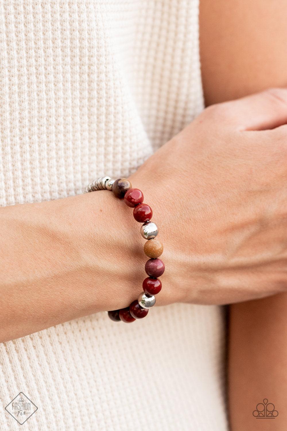 Paparazzi Accessories Pure Prana - Multi Accented with shiny silver beads, a collection of polished multicolored stone beads are fashioned into a wire cuff bracelet. The earthy stones give way on each end to a number of silver rings enclosed by small silv