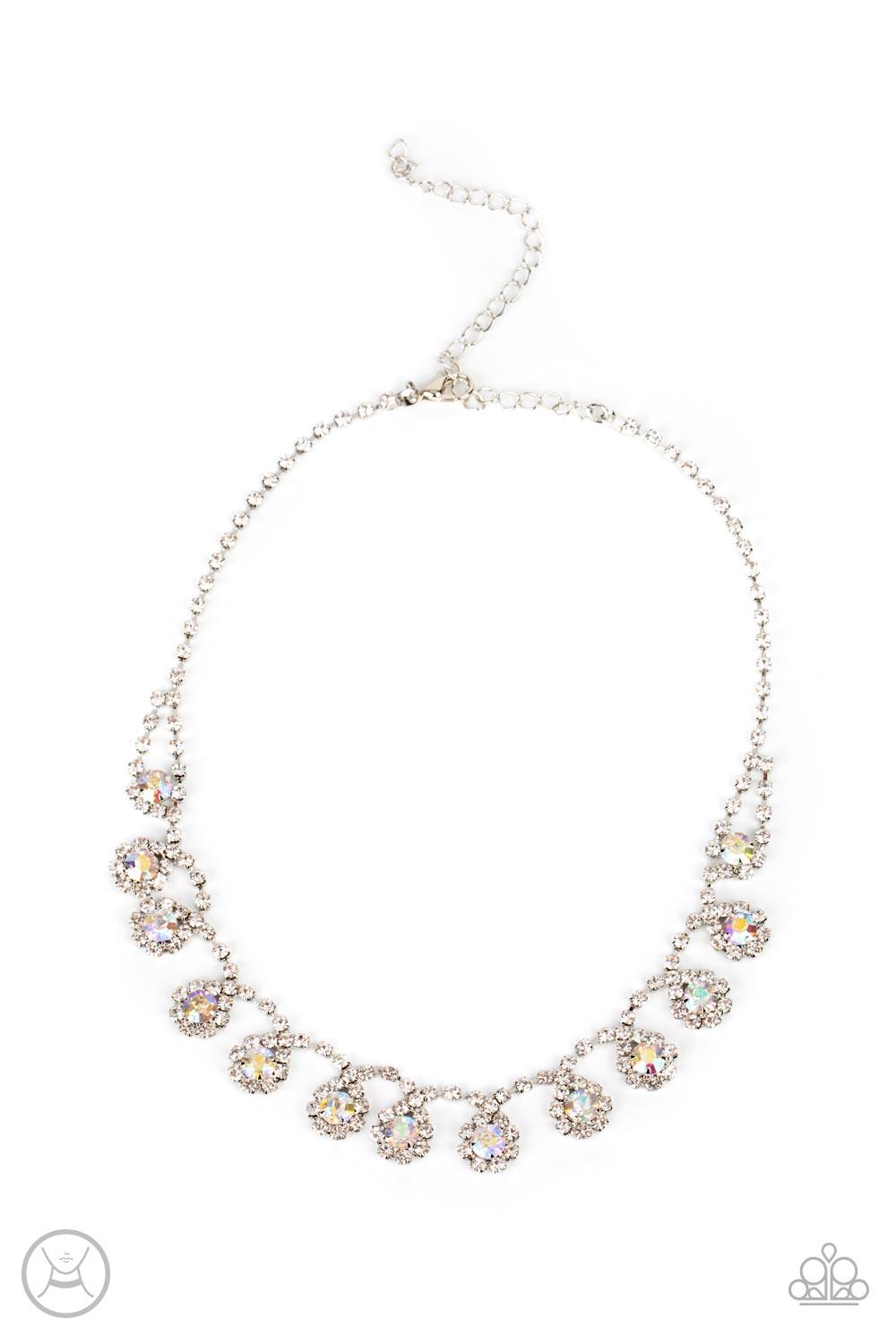 Paparazzi Accessories Princess Prominence - Multi A dainty strand of glittery white rhinestones encircle solitaire iridescent rhinestones around the neck, creating a glitzy fringe. Features an adjustable clasp closure. Sold as one individual choker neckla