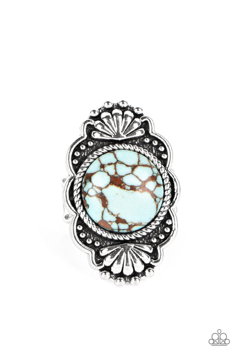 Paparazzi Accessories Atlantis Adventure - Blue Adorned in silver seashells and dainty silver studs, the center of a scalloped silver frame is dotted with an oversized blue stone for an artisan inspired finish. Features a stretchy band for a flexible fit.