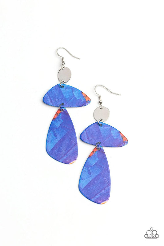 Paparazzi Accessories SWATCH Me Now - Blue Painted in abstract blue details, a pair of asymmetrical frames swing form the bottom of a dainty silver disc for an artsy look. Earring attaches to a standard fishhook fitting. Sold as one pair of earrings. Earr