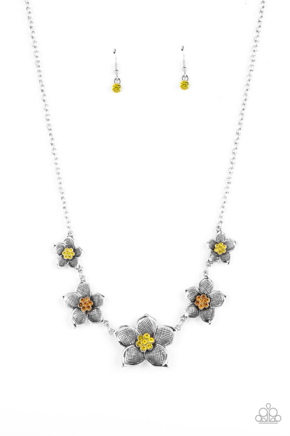 Paparazzi Accessories Wallflower Wonderland - Yellow Gradually increasing in size, textured silver floral frames featuring yellow and orange rhinestone encrusted centers delicately alternate below the collar for a fabulously floral fashion. Features an ad