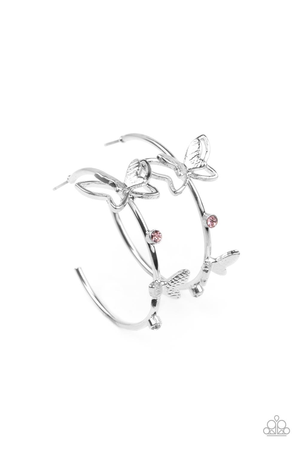 Paparazzi Accessories Full Out Flutter - Pink A pair of dainty silver butterflies flutter atop a glistening silver hoop dotted with dainty pink rhinestones, creating a whimsical sight. Earring attaches to a standard post fitting. Hoop measures approximate