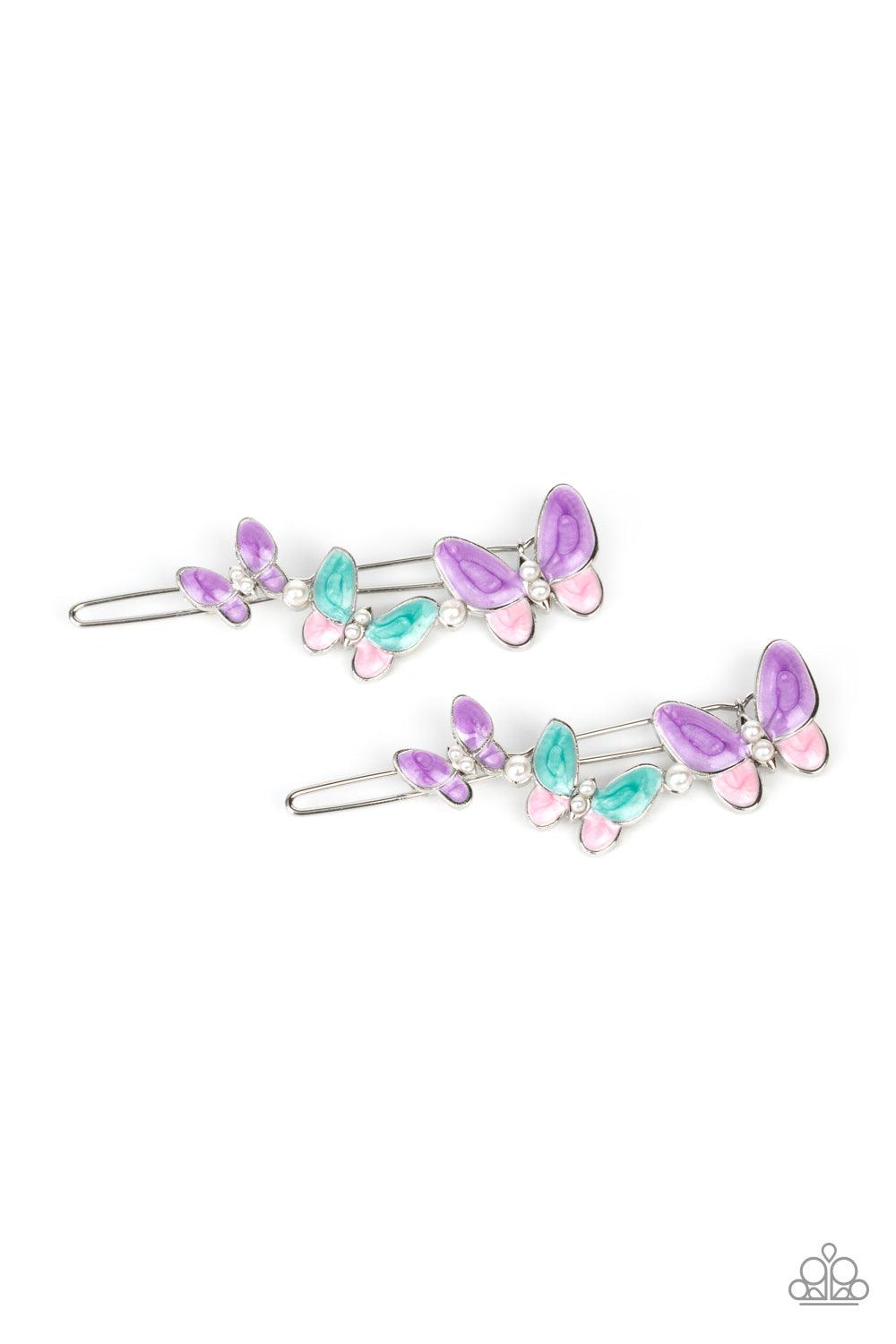 Paparazzi Accessories Bushels of Butterflies - Multi Accented with dainty pearl beads, a kaleidoscope of brightly painted butterflies flutter across the top of a silver clip. Features a standard hair clip on the back. Sold as one pair of hair clips. Brooc