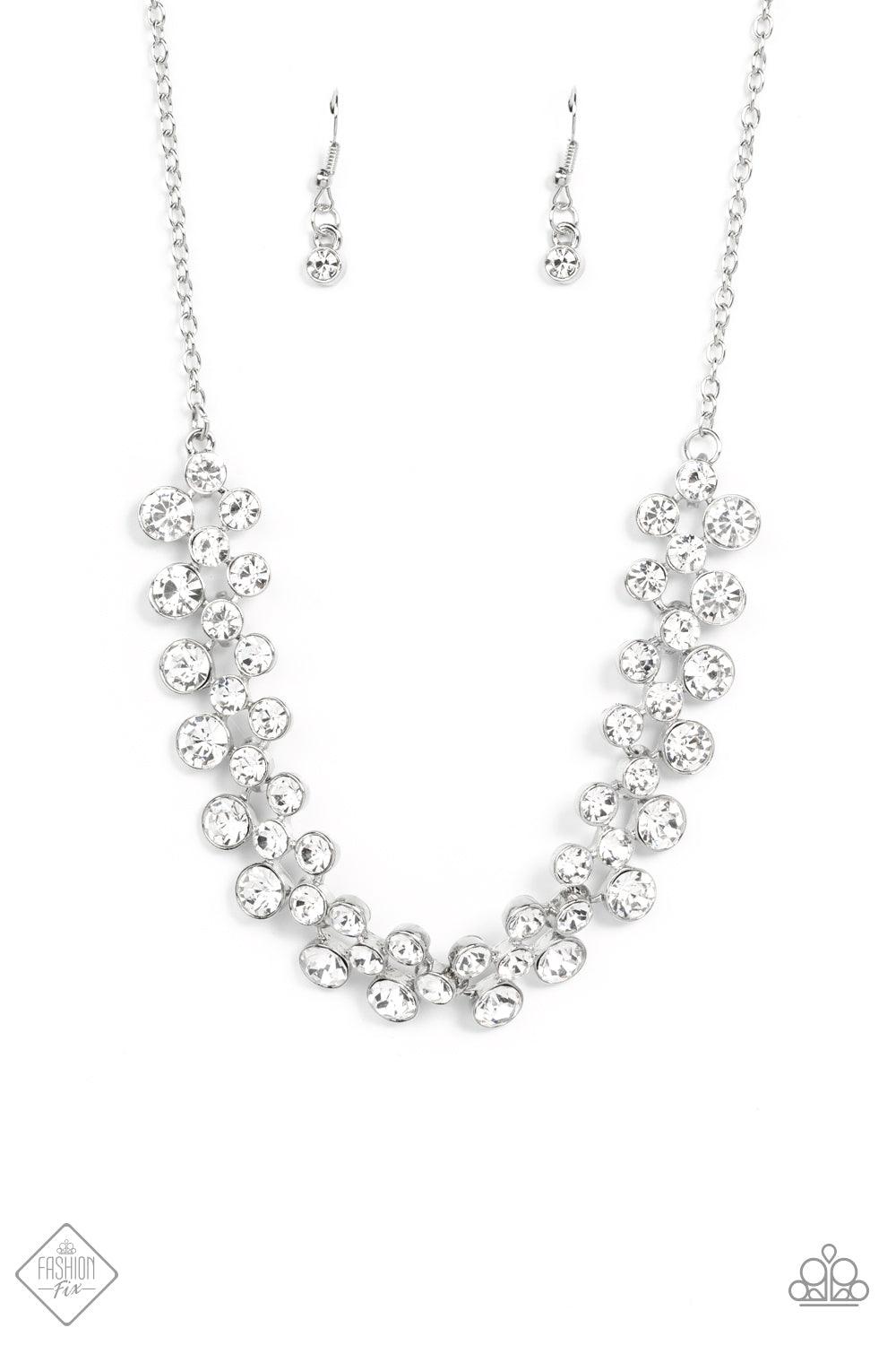 Paparazzi Accessories Won The Lottery - White Layers of brilliant white rhinestones in graduating sizes are encased in simple silver frames as they fall from a classic silver chain and delicately link across the collar, creating a dramatic display of swoo