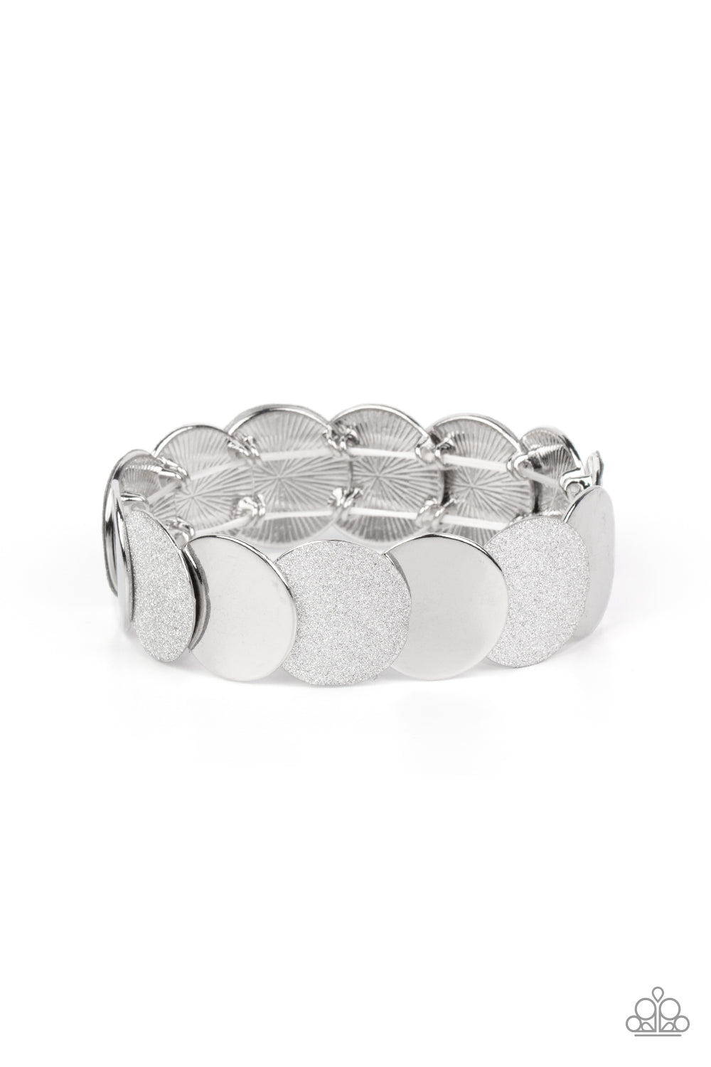 Paparazzi Accessories Demurely Disco - Silver A glimmering collection of shiny silver discs and glitter coated silver discs delicately overlap along stretchy bands around the wrist, creating a dazzling hint of shimmer. Sold as one individual bracelet. Bra