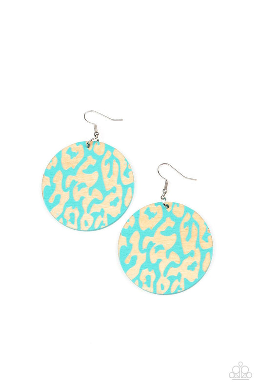 Paparazzi Accessories Catwalk Safari - Blue The front of a blue wooden disc is chiseled away, revealing a colorful cheetah-like pattern for a wild fashion. Earring attaches to a standard fishhook fitting. Sold as one pair of earrings. Jewelry