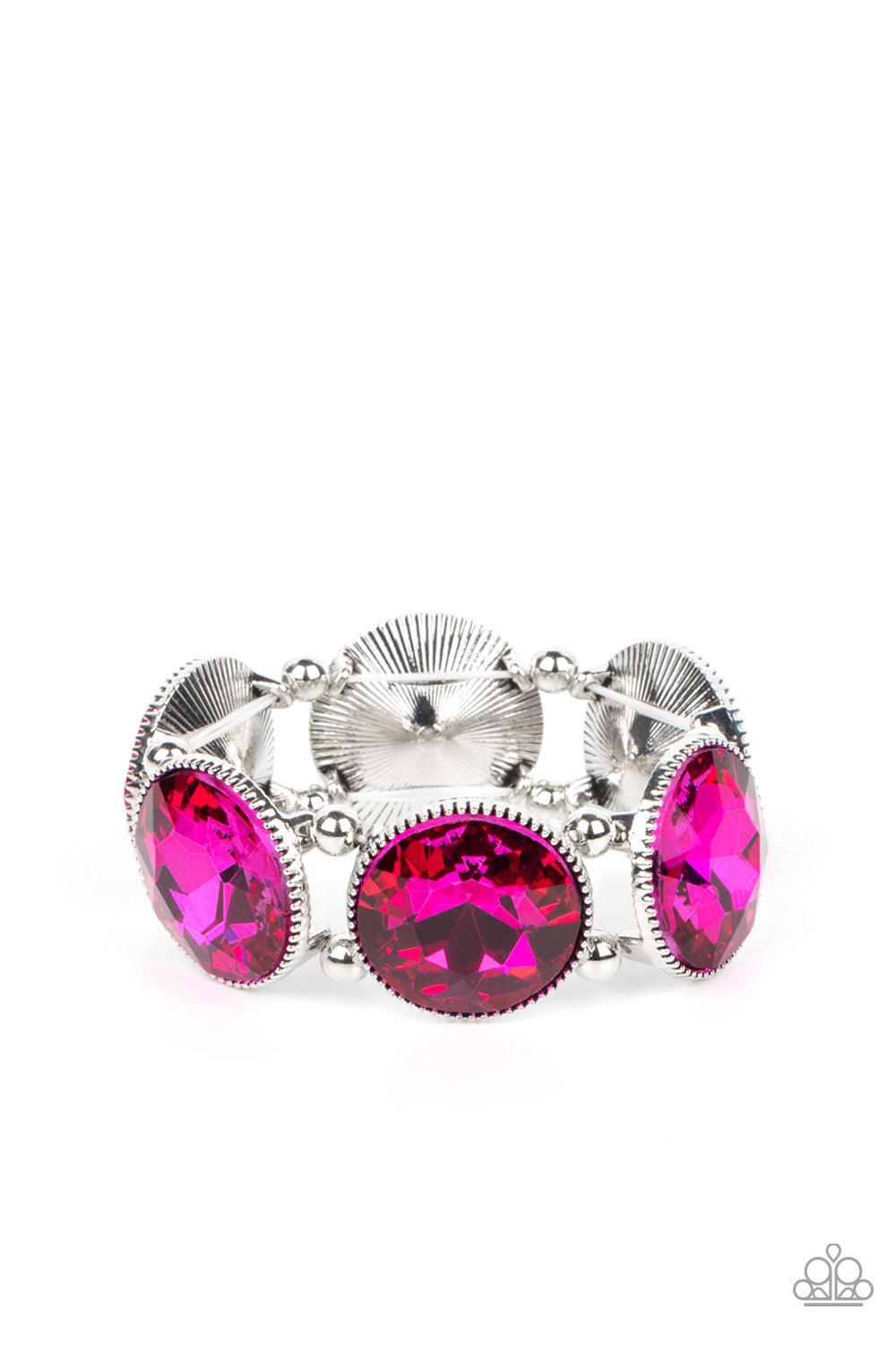 Paparazzi Accessories Powerhouse Hustle - Pink Infused with pairs of silver beads, a glitzy collection of dramatically oversized Fuchsia Fedora rhinestone frames are threaded along stretchy bands around the wrist for a jaw-dropping dazzle. Sold as one ind