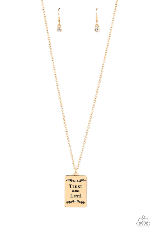 Paparazzi Accessories All About Trust - Gold Bordered in leafy patterns and dainty white rhinestones, the center of a gold rectangular frame is stamped in the phrase, "Trust in the Lord," for an inspiring finish. Features an adjustable clasp closure. Sold