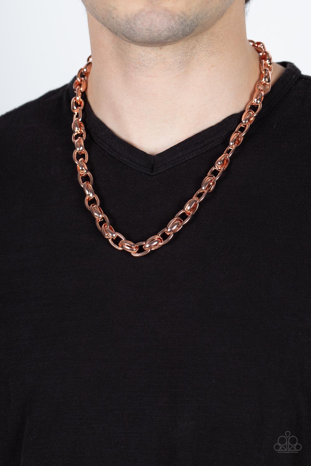 Paparazzi Accessories Rookie of the Year - Copper A chunky collection of bold shiny copper links interlock across the chest, creating an intense industrial centerpiece. Features an adjustable clasp closure. Sold as one individual necklace. Necklaces