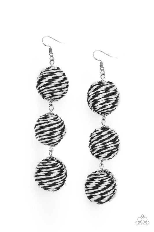 Paparazzi Accessories Laguna Lanterns - Black A woven collection of black and white crepe-like strings ornately wraps around three hanging beads, reminiscent of decorative party lanterns. Earring attaches to a standard fishhook fitting. Sold as one pair o